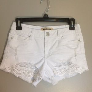 Distressed White Denim Shorts with Lace Detail 1
